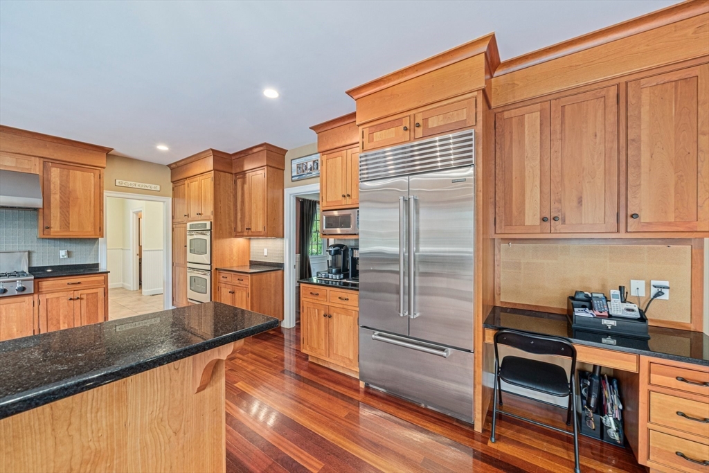 6 Northey Farm Road Scituate, MA 02066 - Photo 14 of 40 a kitchen with stainless steel appliances granite countertop a refrigerator and a stove top oven