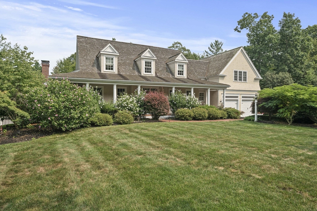 6 Northey Farm Road Scituate, MA 02066 - Photo 2 of 40 a front view of a house with a garden