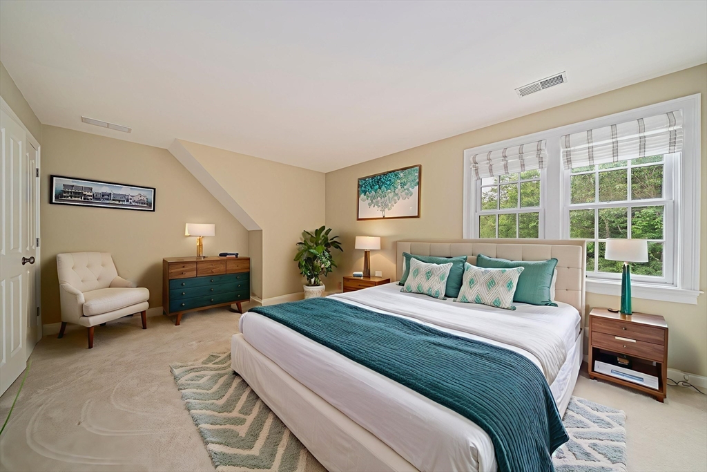 6 Northey Farm Road Scituate, MA 02066 - Photo 27 of 40 a bedroom with a bed and a couch