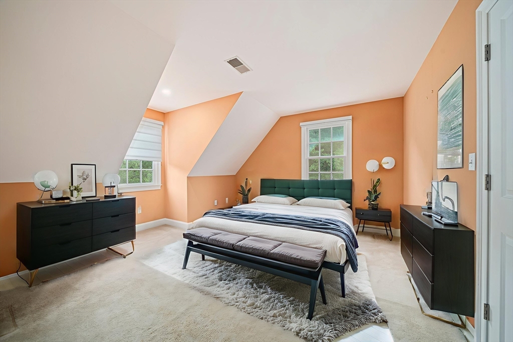 6 Northey Farm Road Scituate, MA 02066 - Photo 28 of 40 a bedroom with a bed and wooden floor