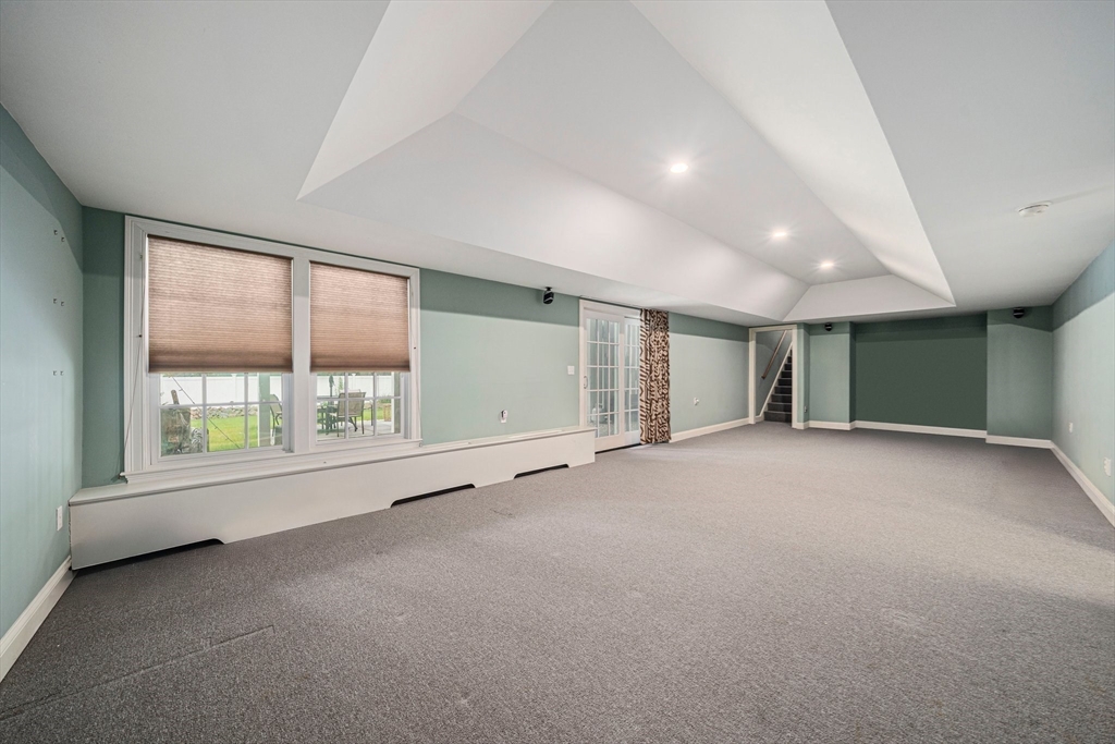 6 Northey Farm Road Scituate, MA 02066 - Photo 32 of 40 an empty room with a empty space and windows