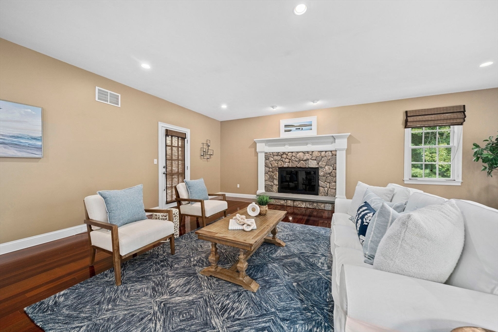6 Northey Farm Road Scituate, MA 02066 - Photo 6 of 40 a living room with furniture and a fireplace