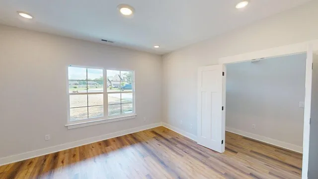 a bathroom with a sink a mirror and a shower