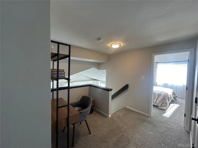 a view of entryway with livingroom and furniture