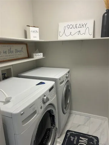 a kitchen with stainless steel appliances kitchen island granite countertop a sink and cabinets