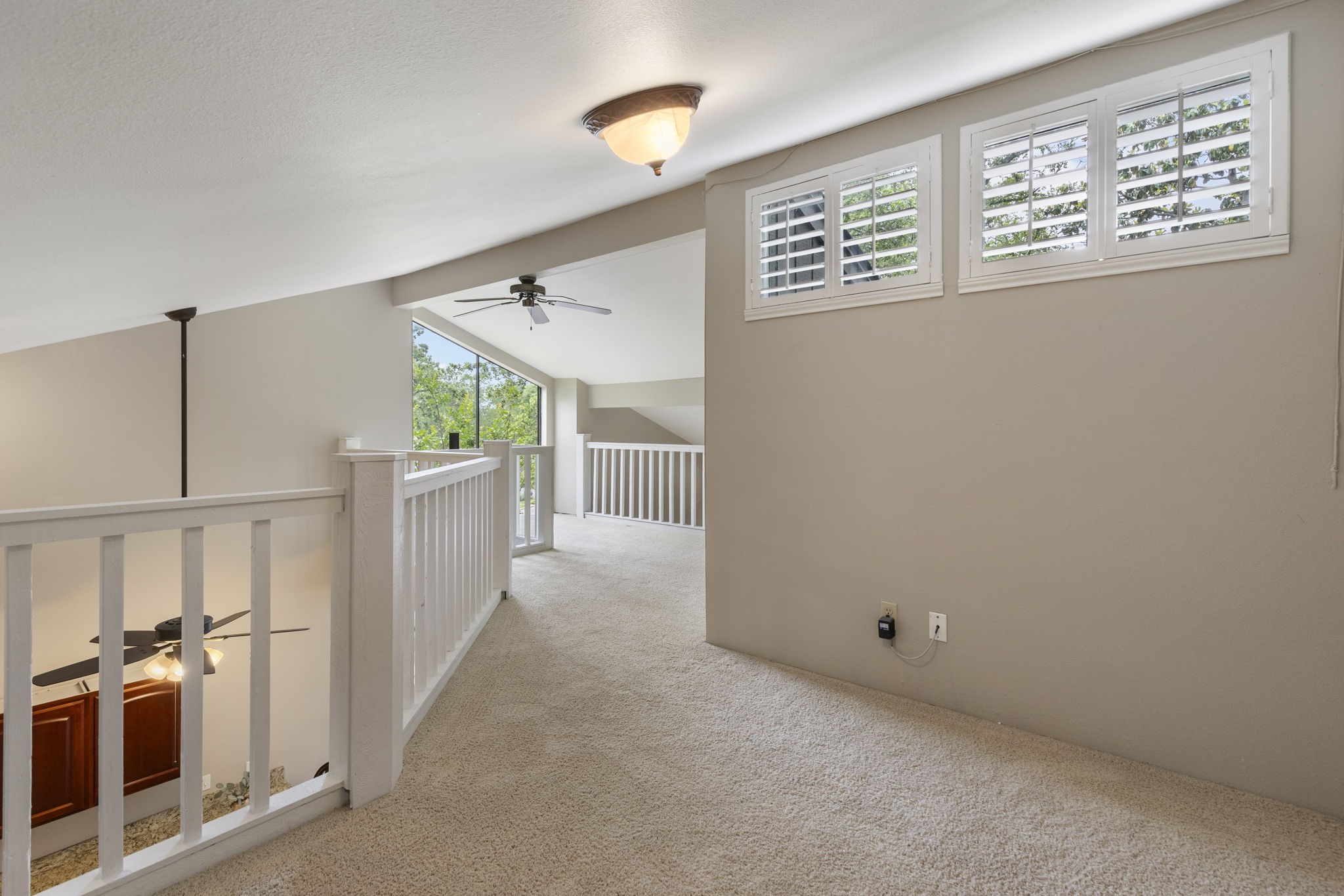 49 April Village Conroe, TX 77356 - Photo 15 of 46 a view of a hallway with workspace