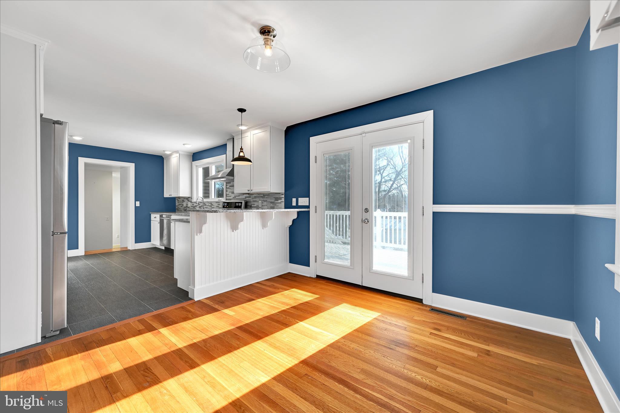 104 Locust Street Annville, PA 17003 - Photo 11 of 43 a view of a kitchen with wooden floor and a kitchen