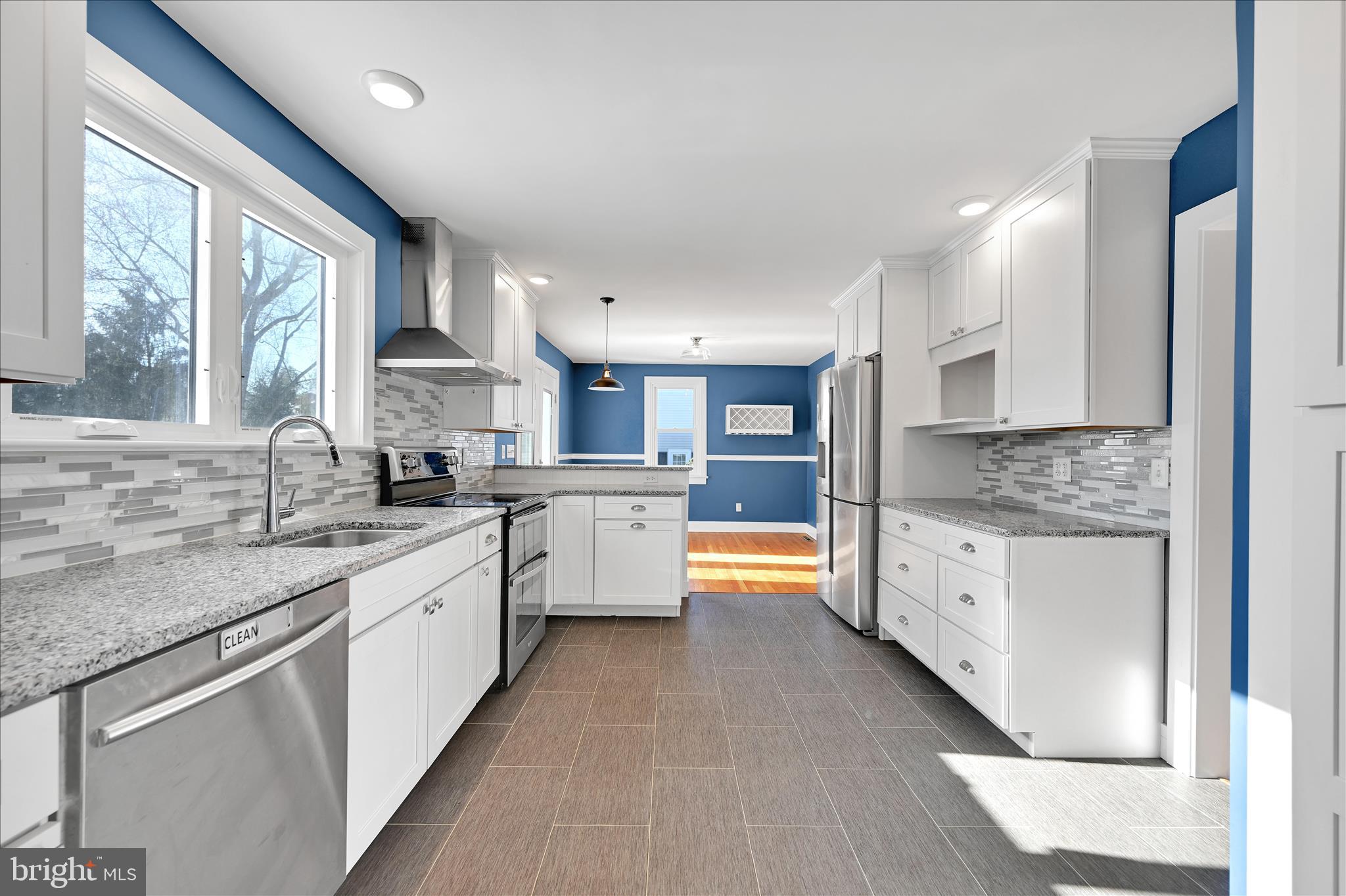 104 Locust Street Annville, PA 17003 - Photo 14 of 43 a large kitchen with stainless steel appliances granite countertop a lot of counter space and a sink