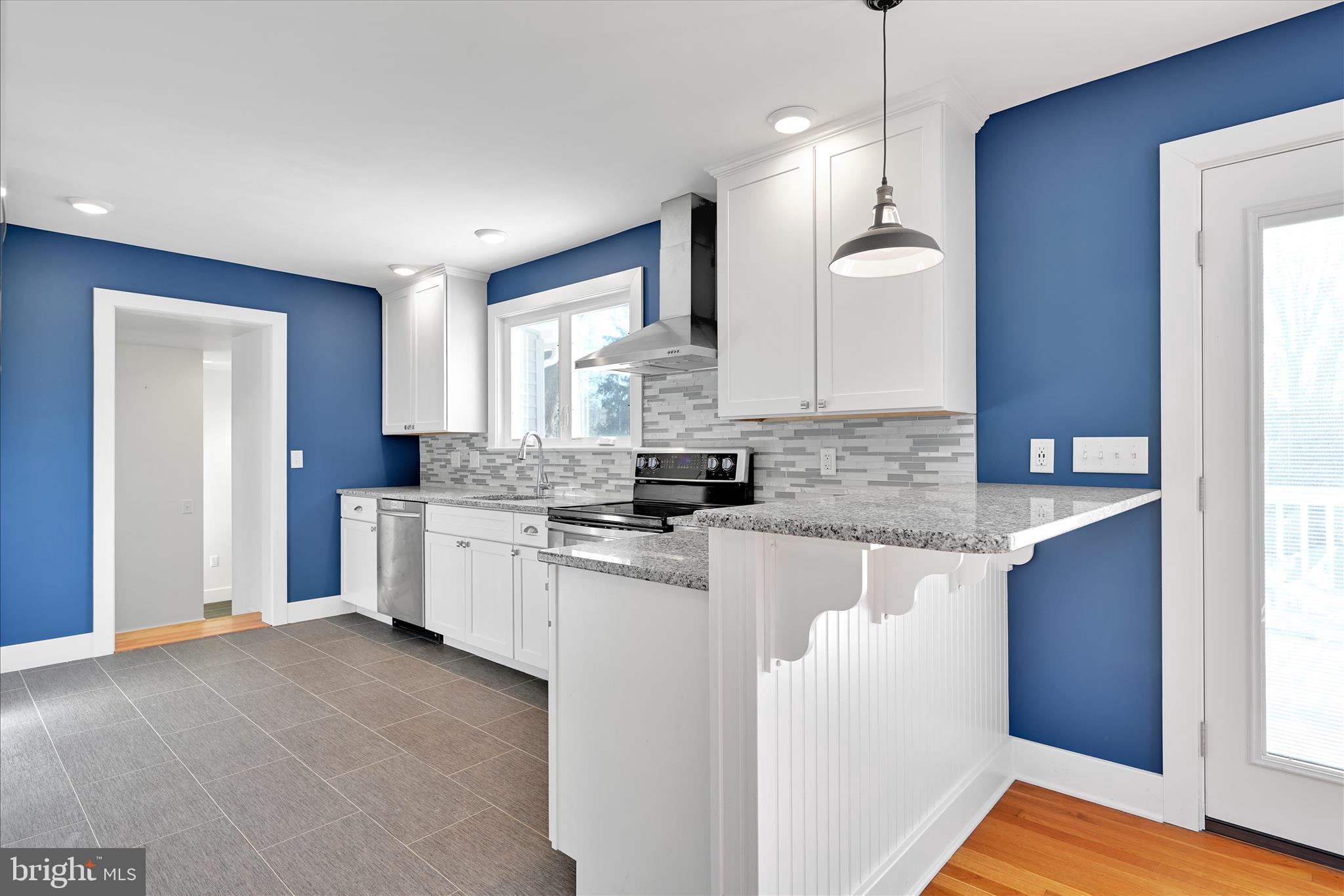 104 Locust Street Annville, PA 17003 - Photo 16 of 43 a kitchen with stainless steel appliances granite countertop a sink stove and refrigerator