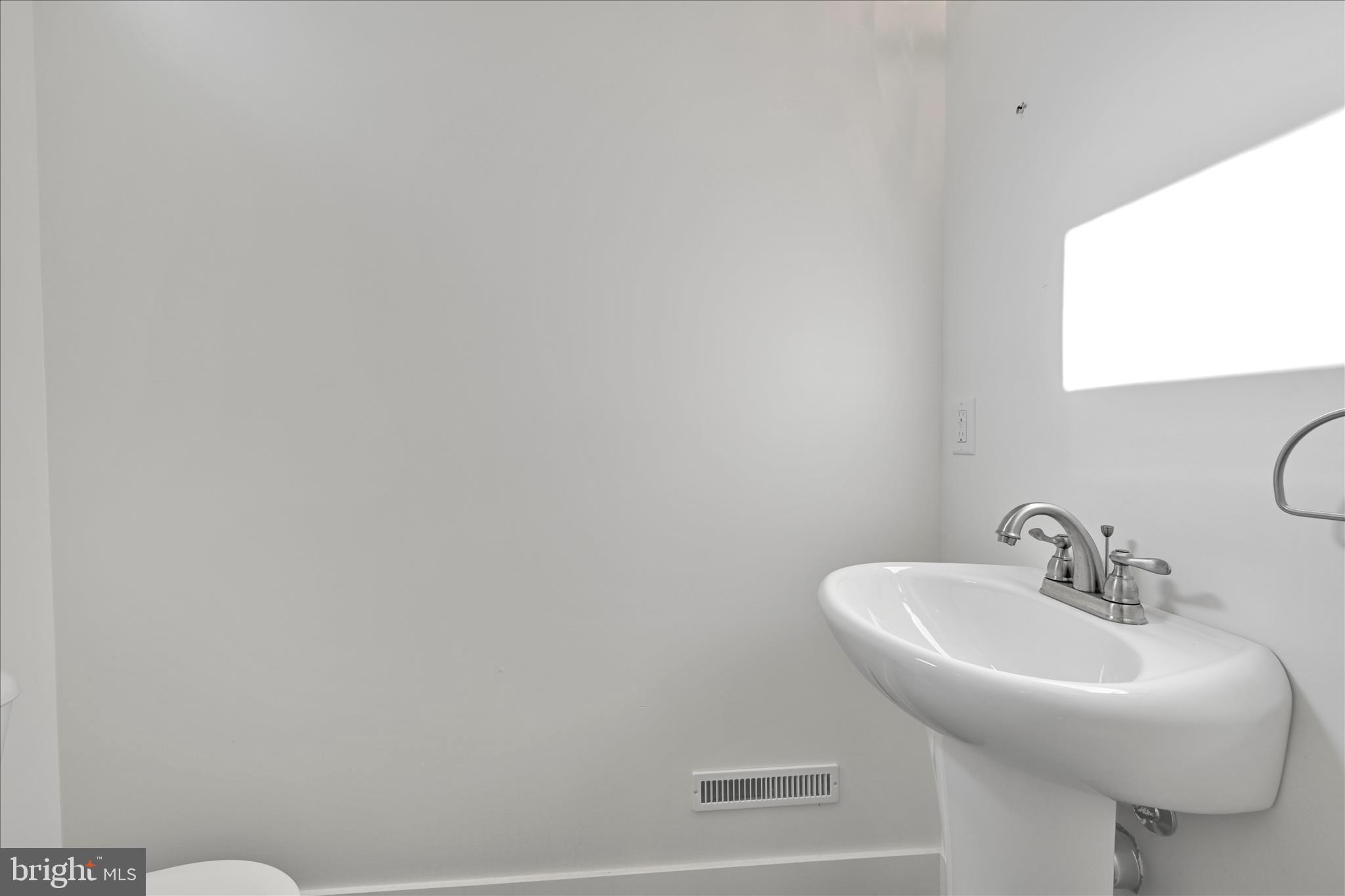 104 Locust Street Annville, PA 17003 - Photo 17 of 43 a bathroom with a sink and a mirror