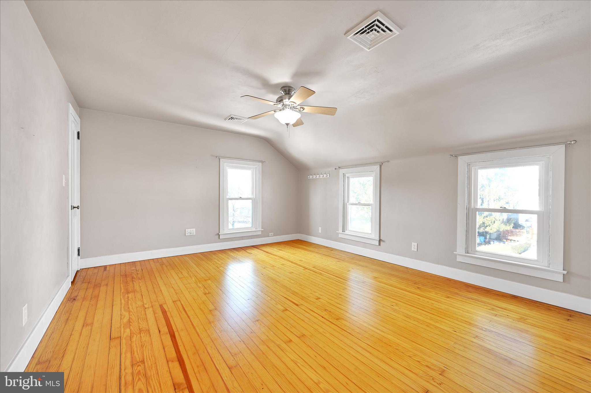 104 Locust Street Annville, PA 17003 - Photo 20 of 43 a view of empty room with wooden floor and fan