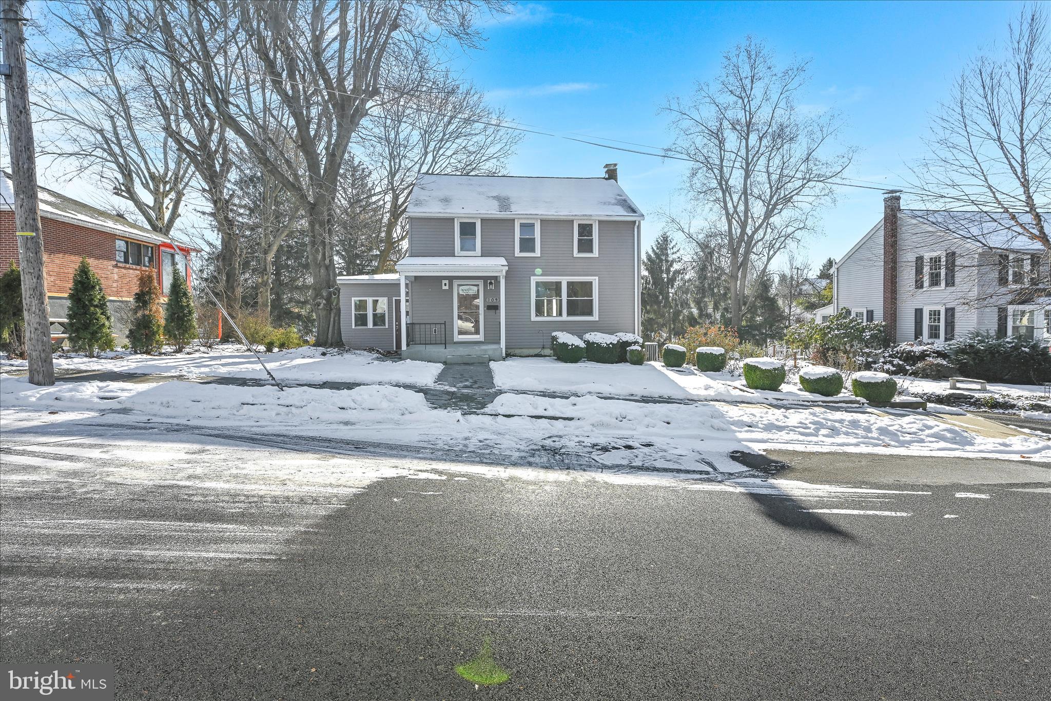 104 Locust Street Annville, PA 17003 - Photo 2 of 43 a front view of residential houses with yard and trees