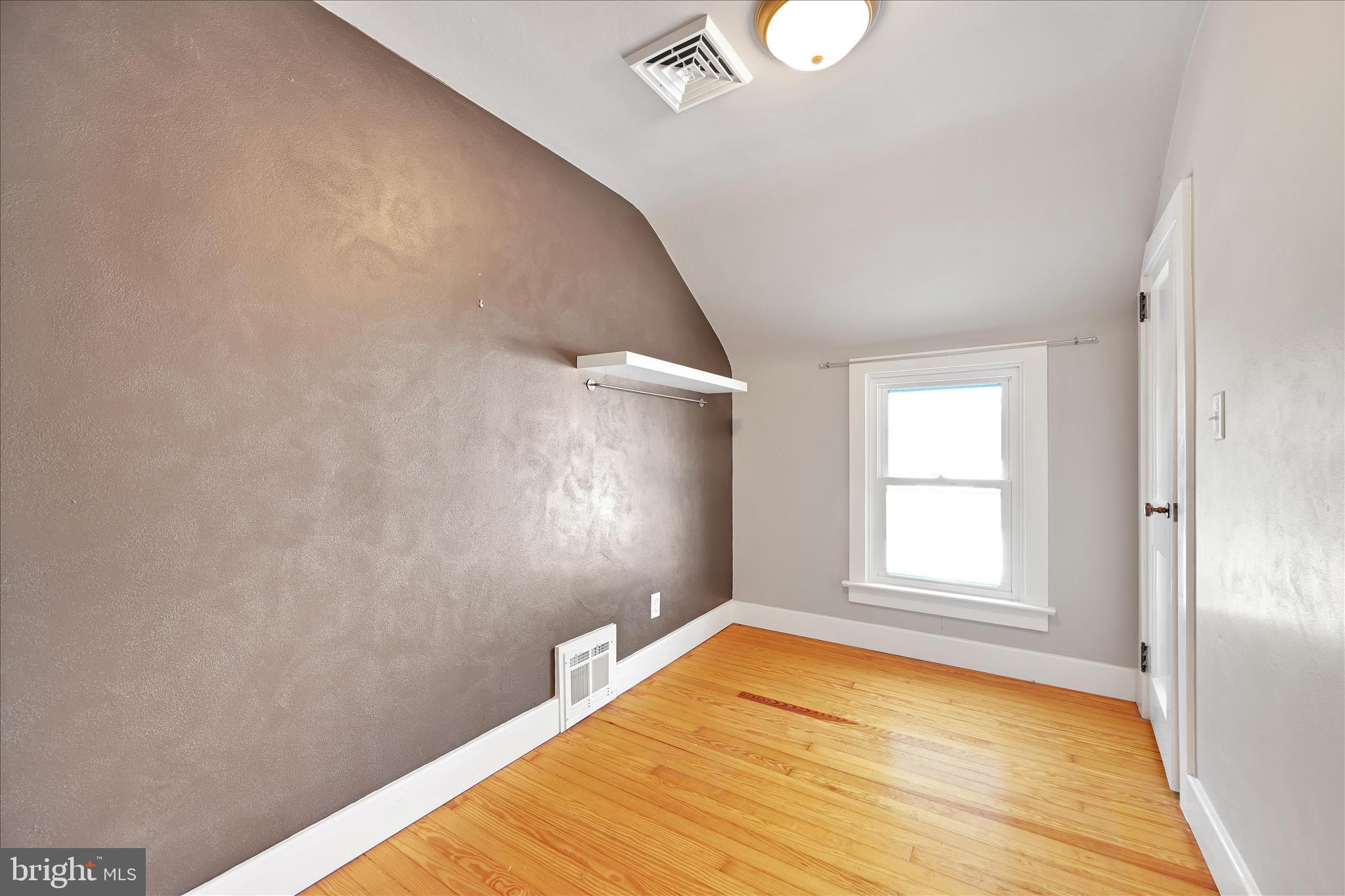 104 Locust Street Annville, PA 17003 - Photo 22 of 43 a view of empty room with wooden floor