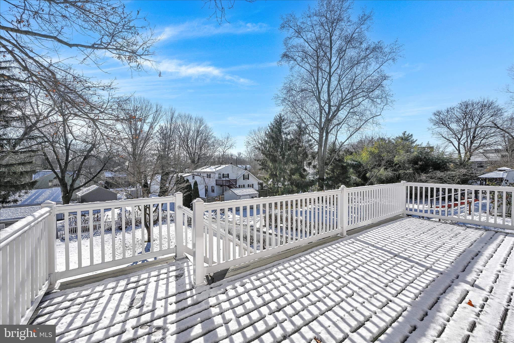 104 Locust Street Annville, PA 17003 - Photo 32 of 43 a view of a roof deck with wooden fence and trees