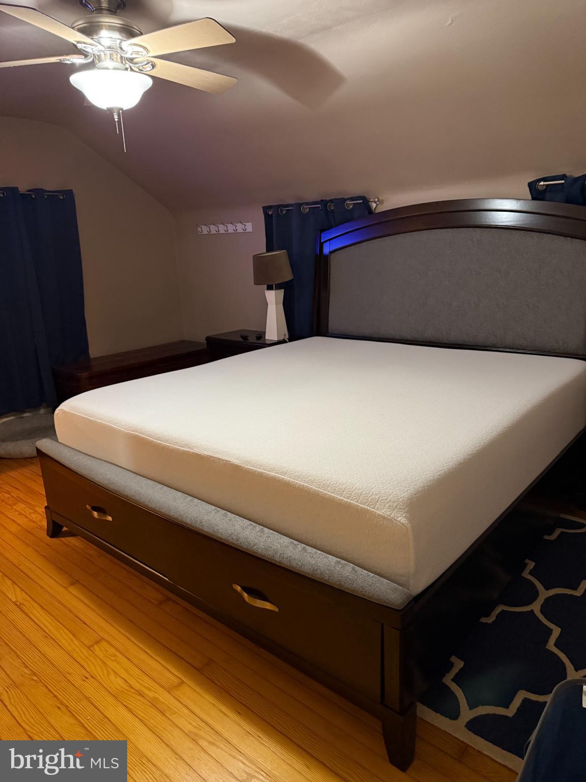 104 Locust Street Annville, PA 17003 - Photo 39 of 43 a bedroom with a bed and lamp on desk