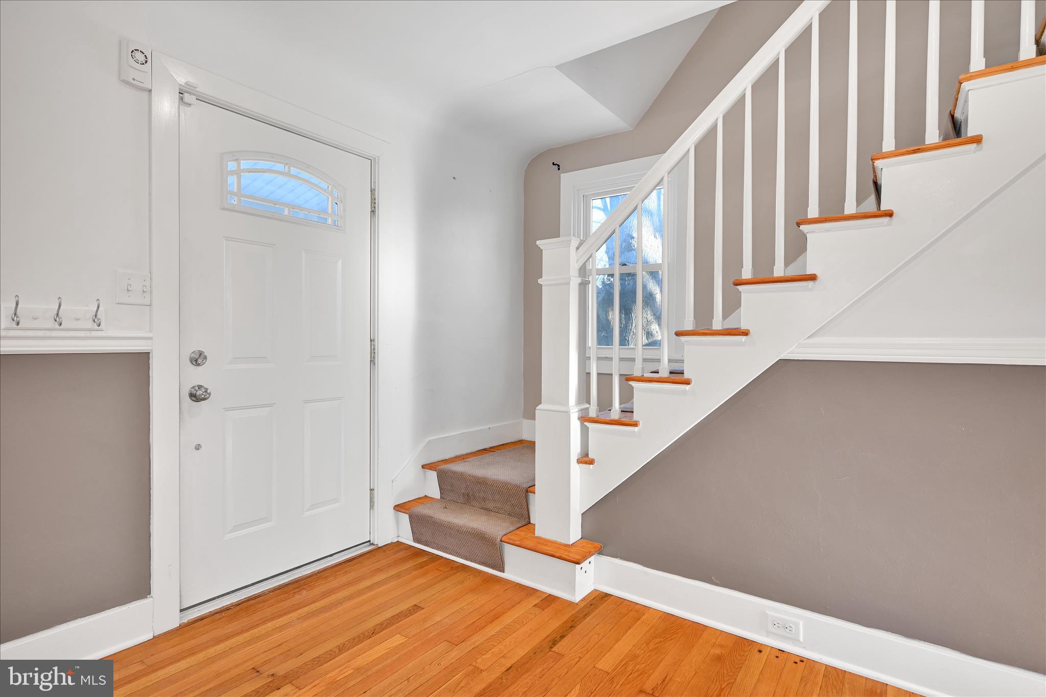 104 Locust Street Annville, PA 17003 - Photo 7 of 43 a view of entryway and hall with wooden floor