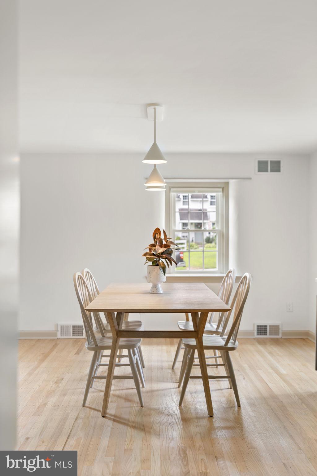218 Engle Drive Wallingford, PA 19086 - Photo 16 of 51 a dining room with furniture and window