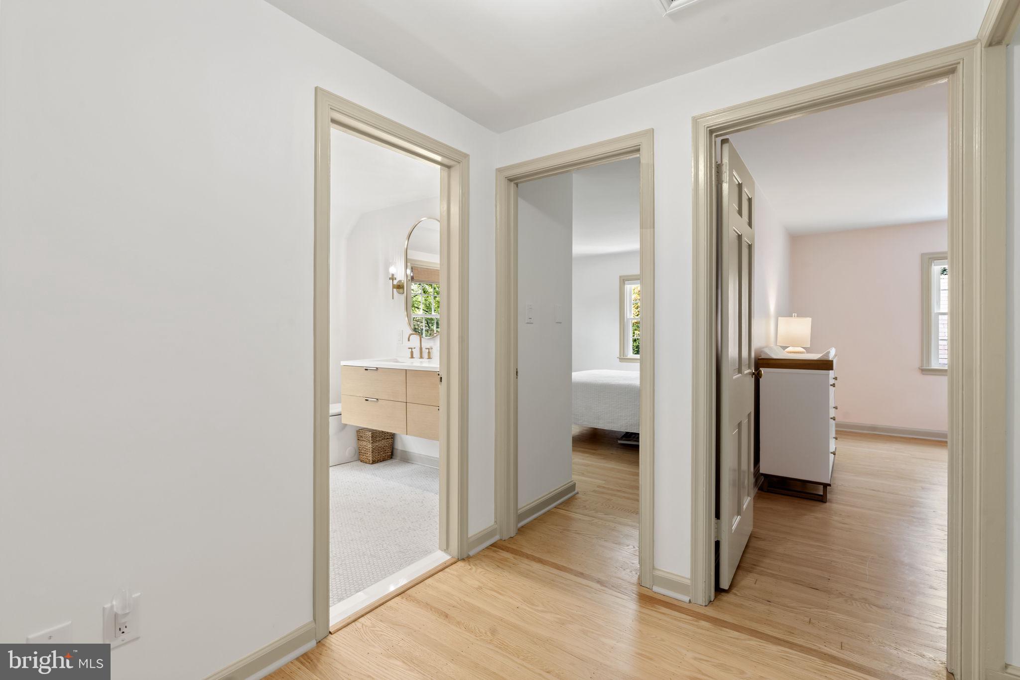 218 Engle Drive Wallingford, PA 19086 - Photo 29 of 51 a bathroom with a glass door shower and a sink