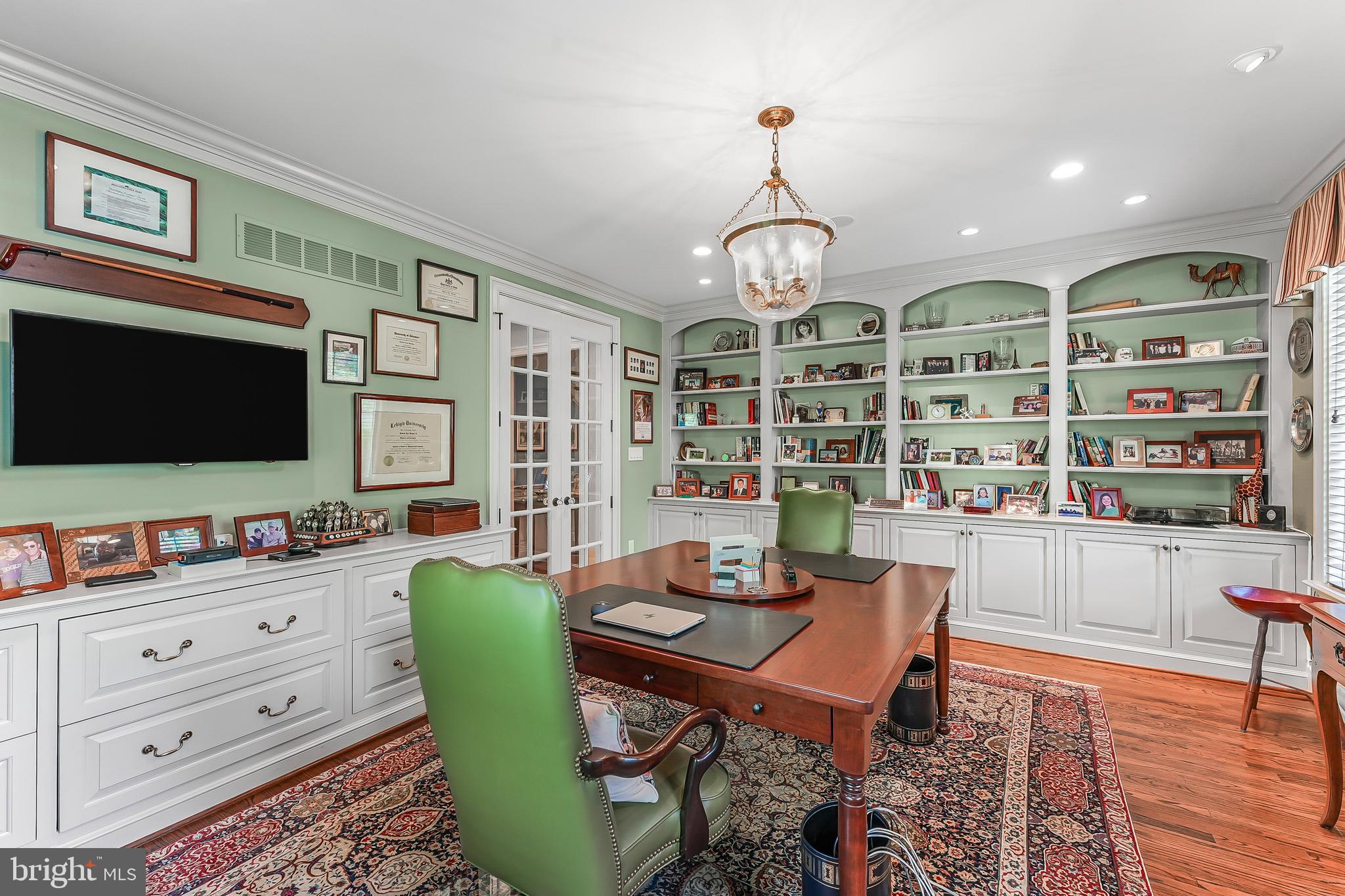 217 Valley Ridge Road Haverford, PA 19041 - Photo 16 of 49 a view of a dining room with furniture a rug and wooden floor