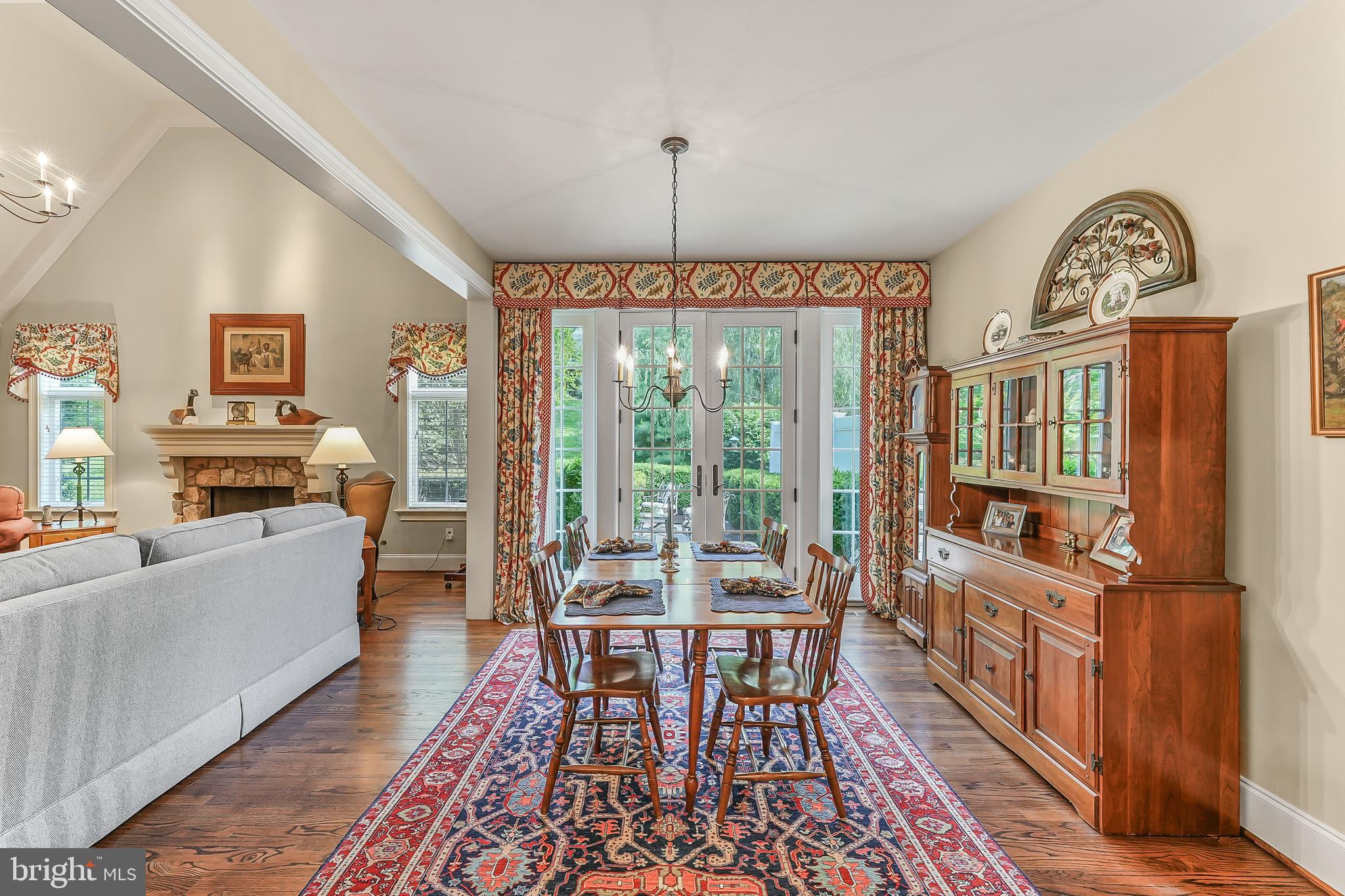 217 Valley Ridge Road Haverford, PA 19041 - Photo 20 of 49 a living room with furniture a flat screen tv and a floor to ceiling window