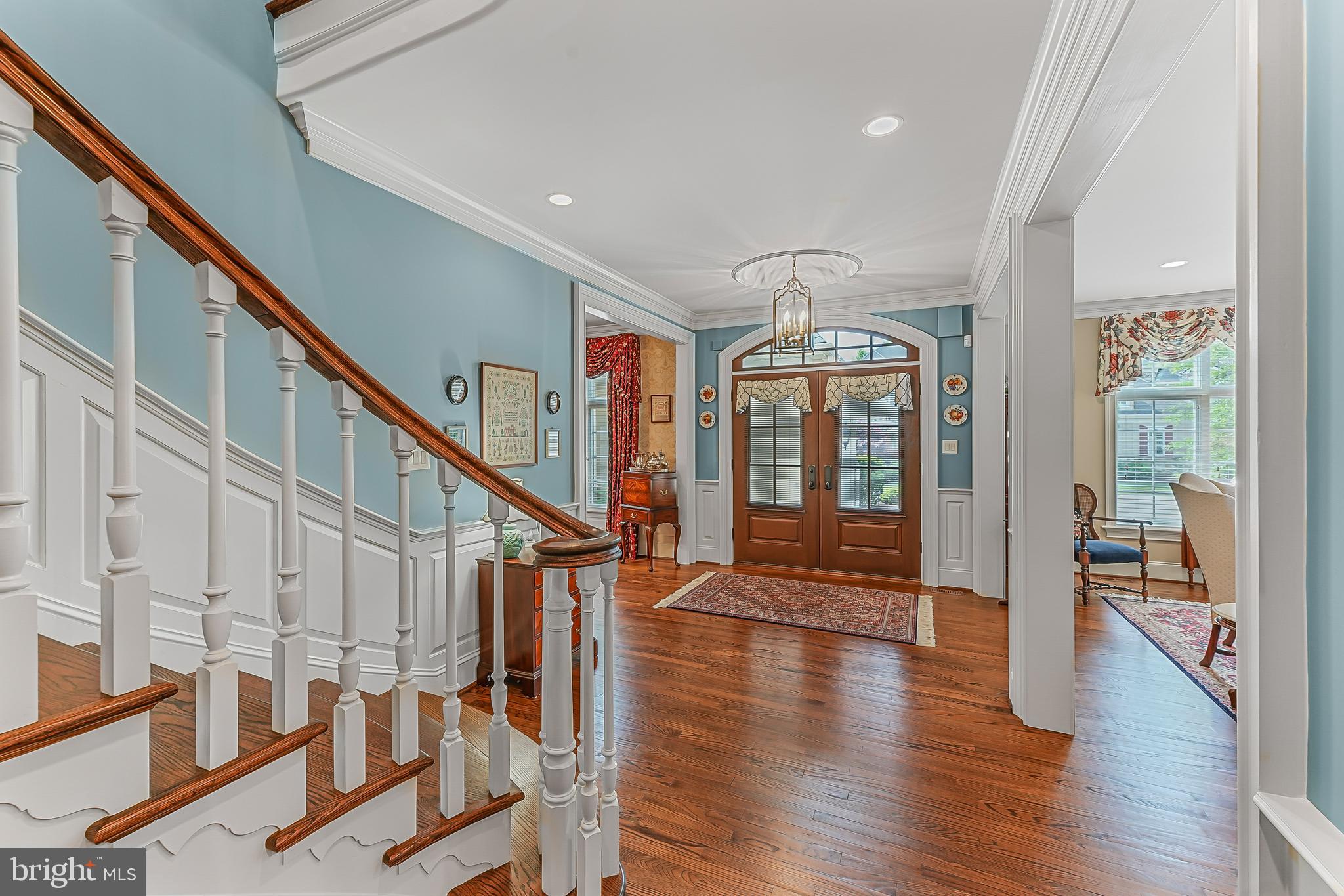 217 Valley Ridge Road Haverford, PA 19041 - Photo 23 of 49 a view of an entryway door with wooden floor and windows