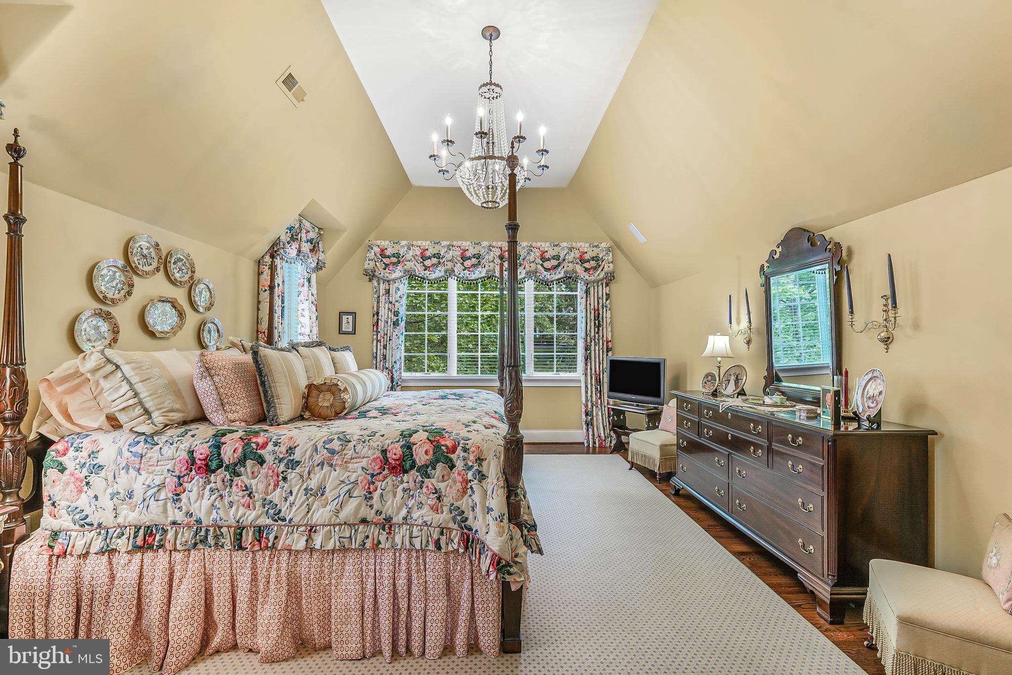 217 Valley Ridge Road Haverford, PA 19041 - Photo 25 of 49 a bedroom with bed and a chandelier