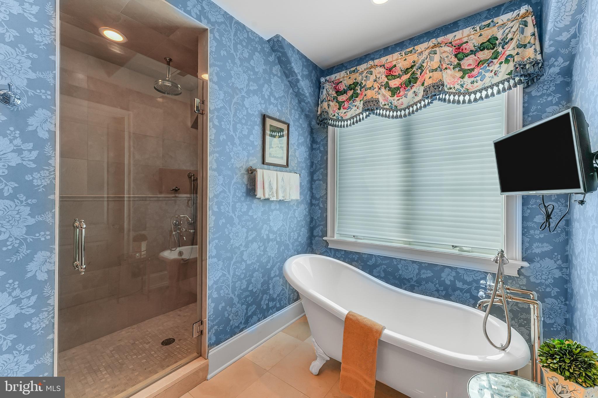 217 Valley Ridge Road Haverford, PA 19041 - Photo 29 of 49 a bathroom with a bathtub and a shower