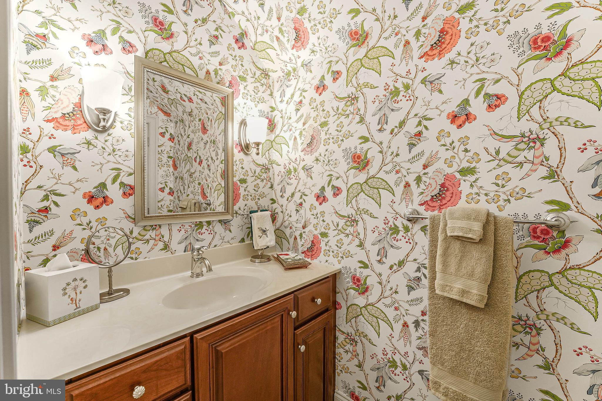 217 Valley Ridge Road Haverford, PA 19041 - Photo 32 of 49 a bathroom with a sink and a mirror