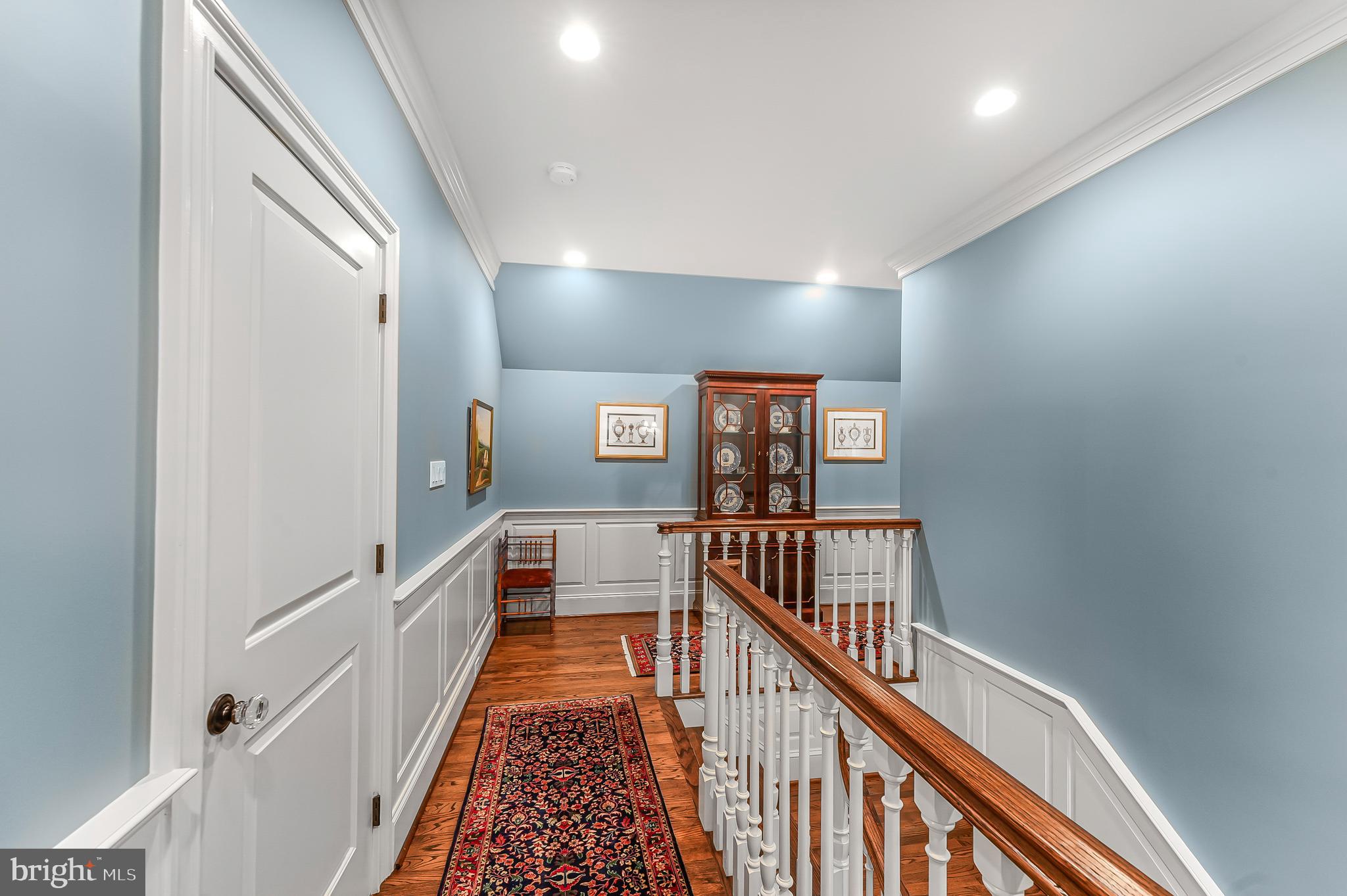 217 Valley Ridge Road Haverford, PA 19041 - Photo 33 of 49 a view of a hallway with wooden floor and stairs
