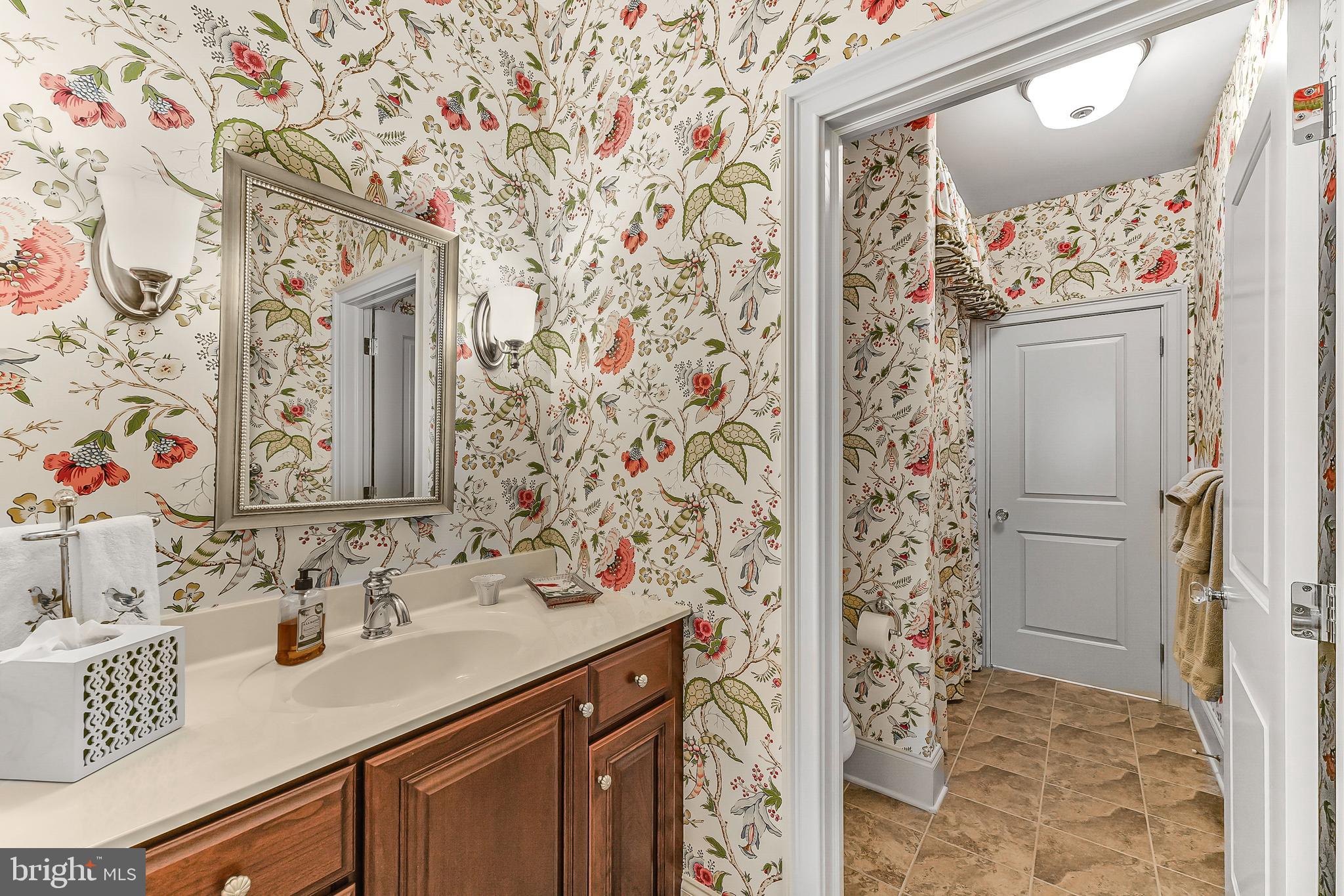 217 Valley Ridge Road Haverford, PA 19041 - Photo 36 of 49 a bathroom with a sink and a mirror