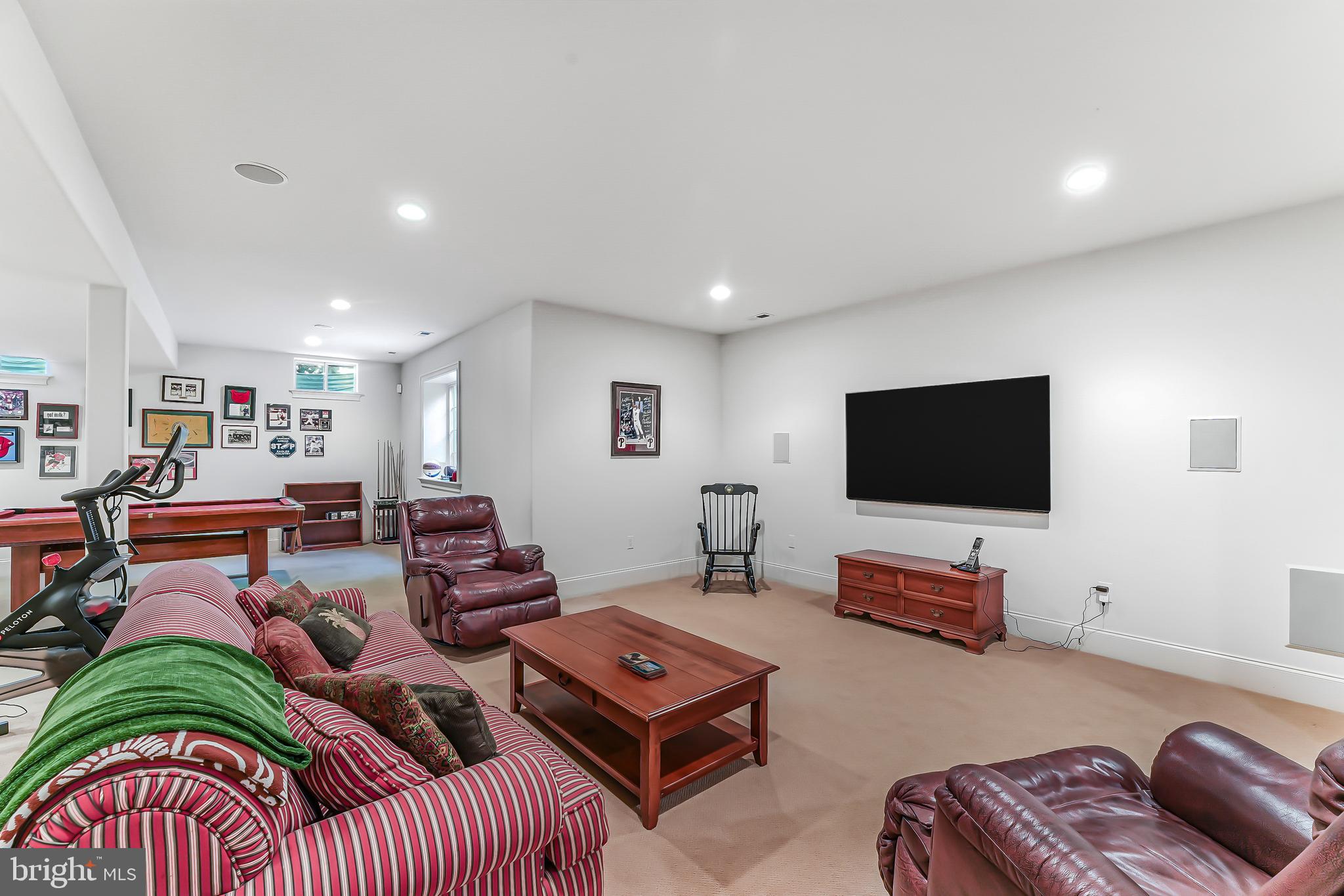 217 Valley Ridge Road Haverford, PA 19041 - Photo 40 of 49 a living room with furniture and a flat screen tv