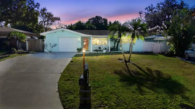 a house view with a garden space