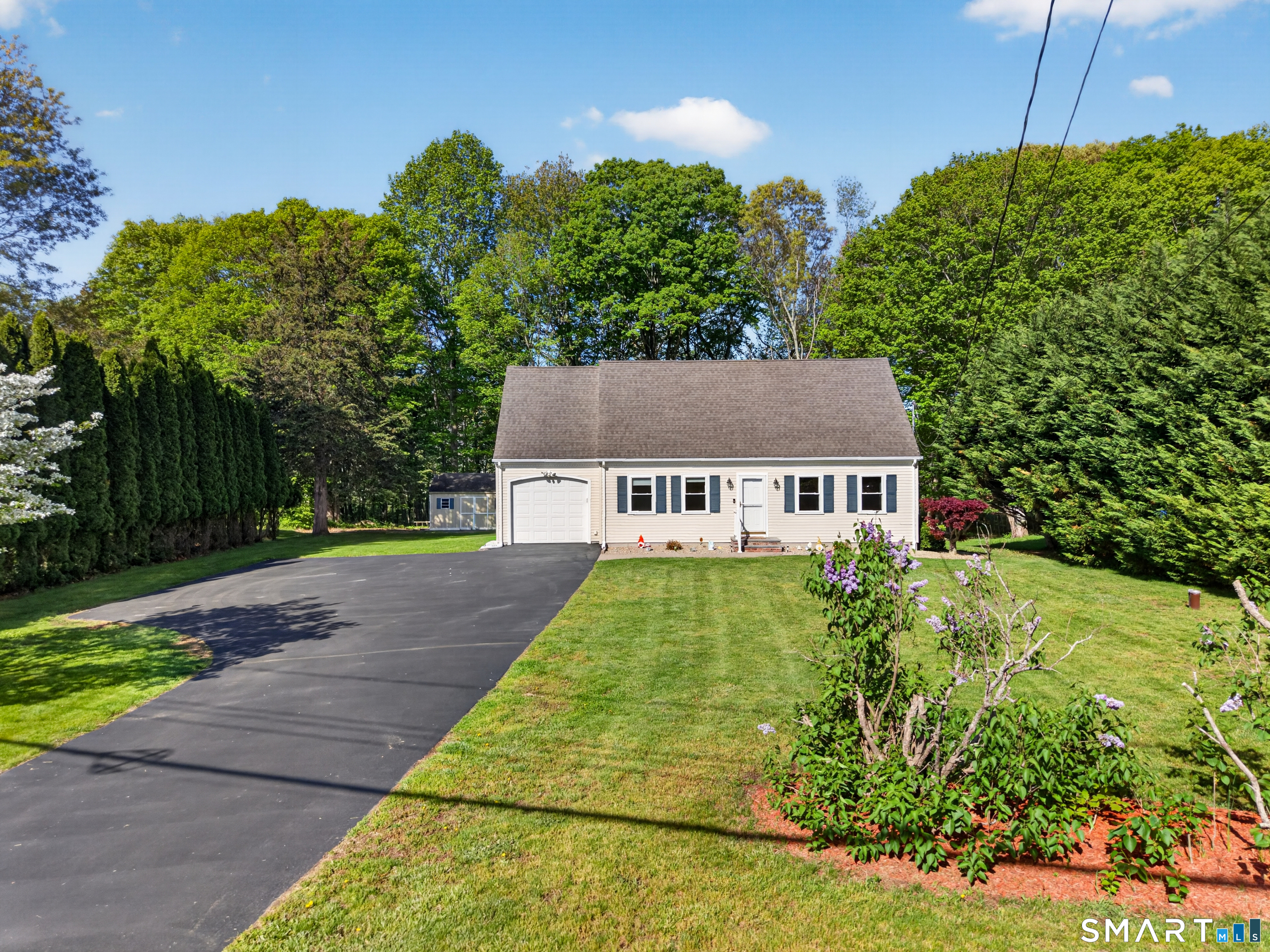 1919 Center Groton Road Ledyard, CT 06339 - Photo 1 of 1 front view of a house with a yard