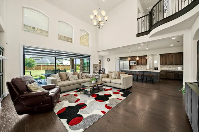 a bedroom with bed and furniture