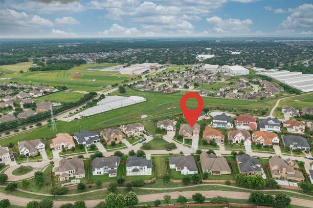 a view of staircase with wooden floor