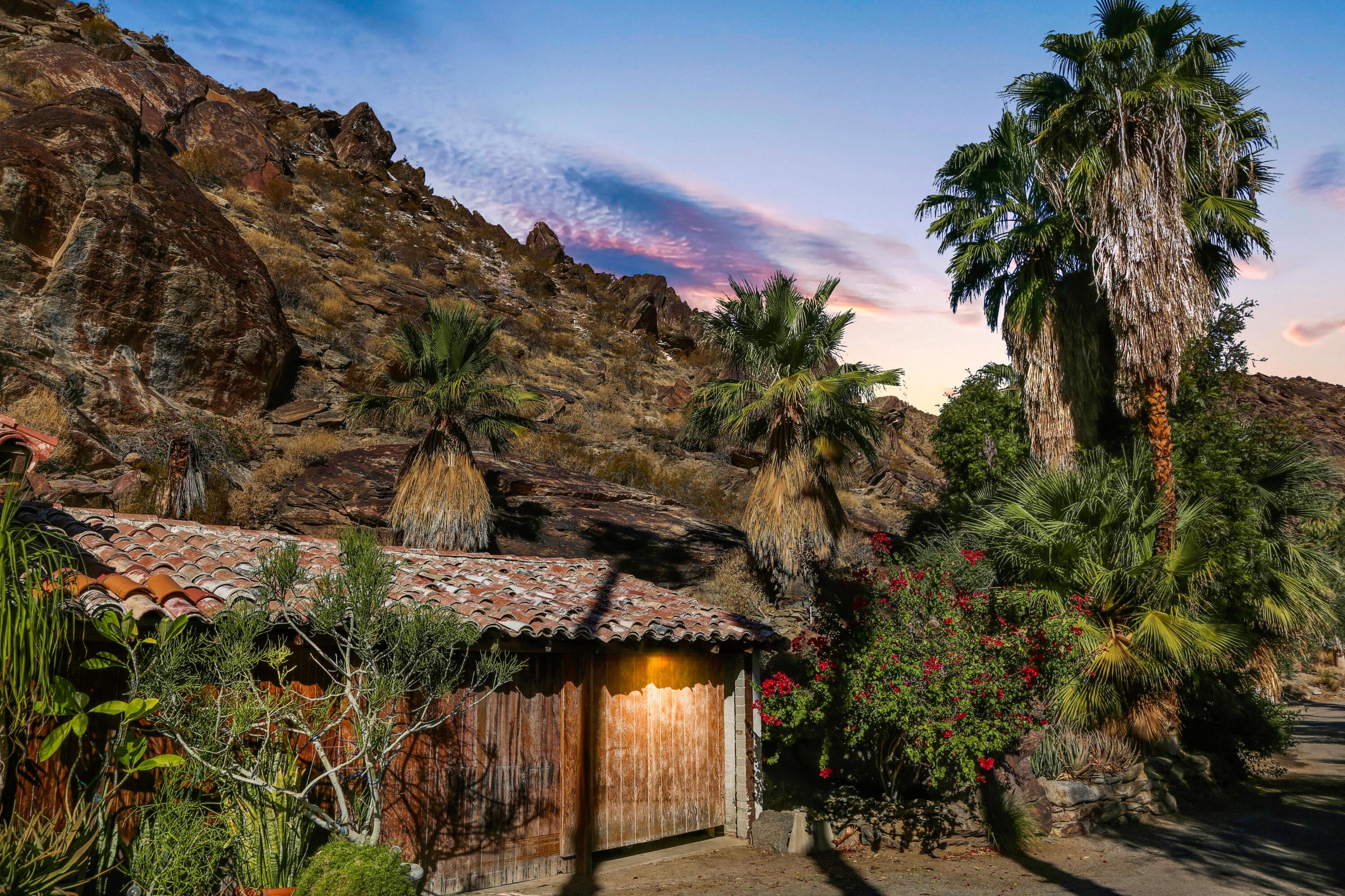 1716 Ridge Road Palm Springs, CA 92264 - Photo 34 of 37 a view of a house in a forest
