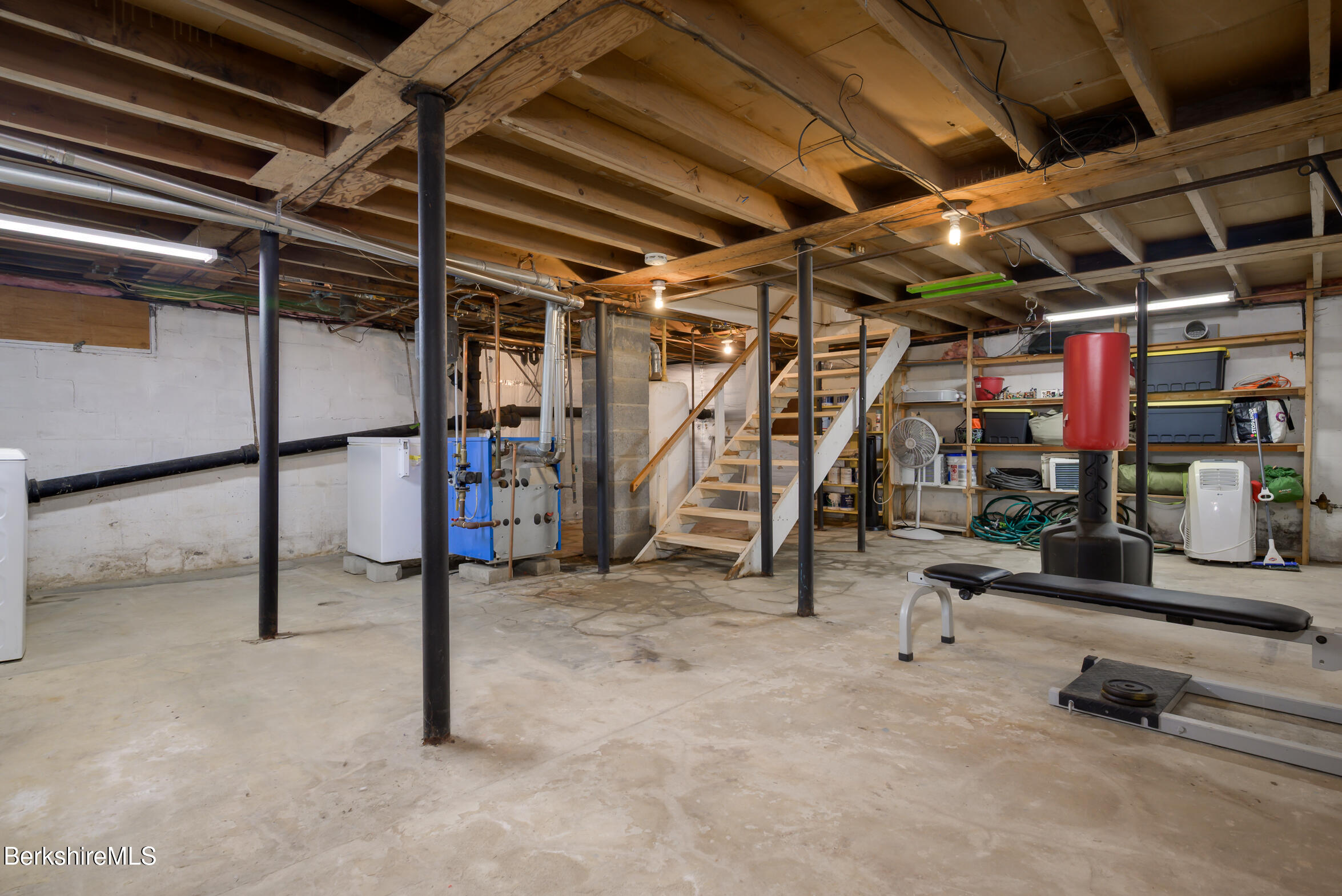 310 Luce Road Williamstown, MA 01267 - Photo 26 of 30 a view of an empty room with gym equipment