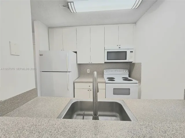 $1,550 | 1225 Northeast 124th Street, Unit 34B, North Miami, FL 33161