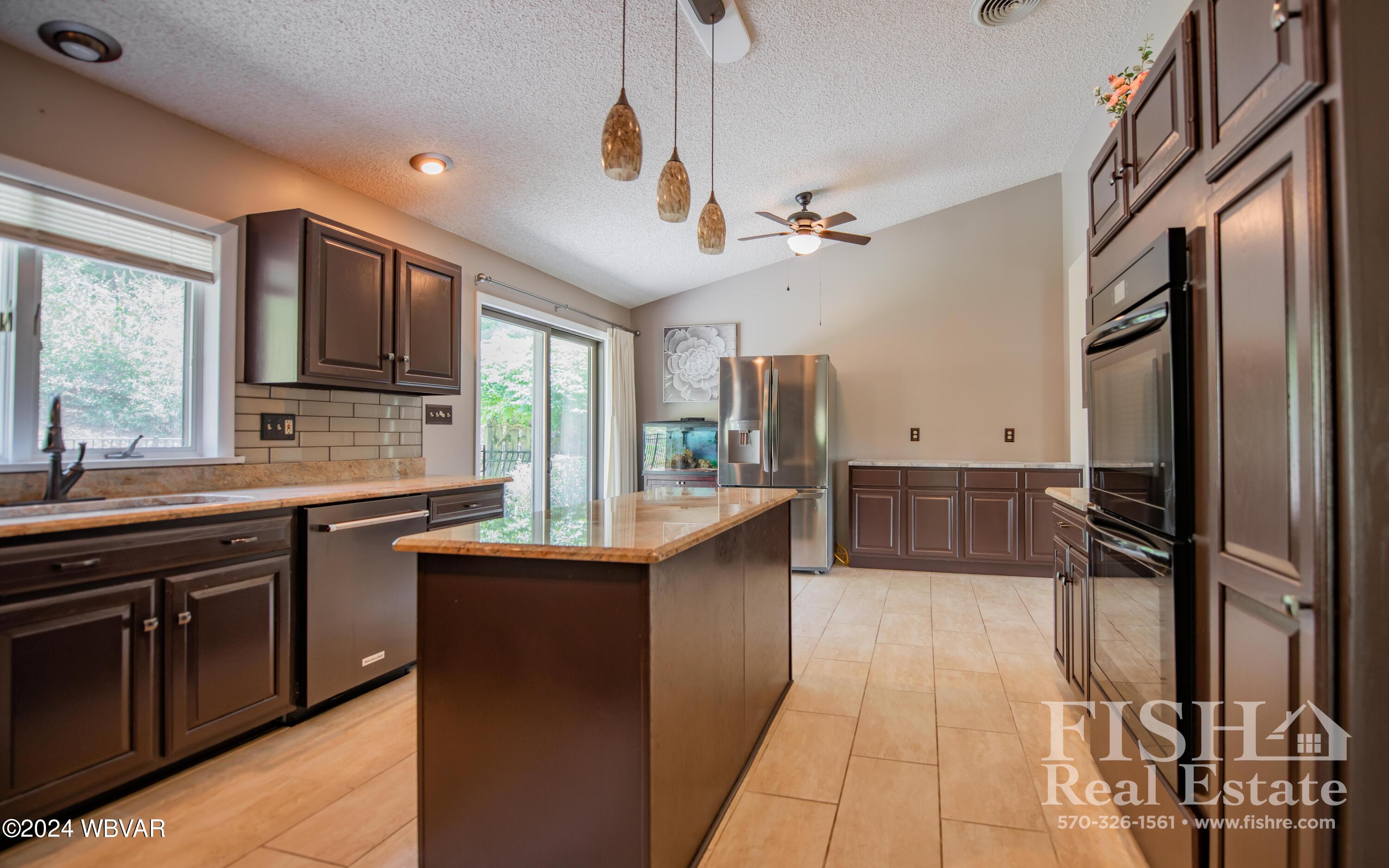 1705 Thomas Road Williamsport, PA 17701 - Photo 8 of 18 Generous sized Kitchen with plenty of storage and Island.