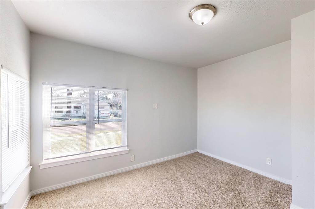 2667 Custer Drive Dallas, TX 75216 - Photo 19 of 33 an empty room with a window