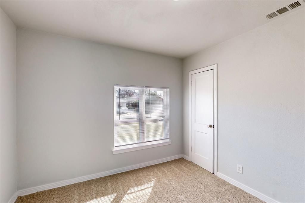 2667 Custer Drive Dallas, TX 75216 - Photo 22 of 33 a view of an empty room with a window