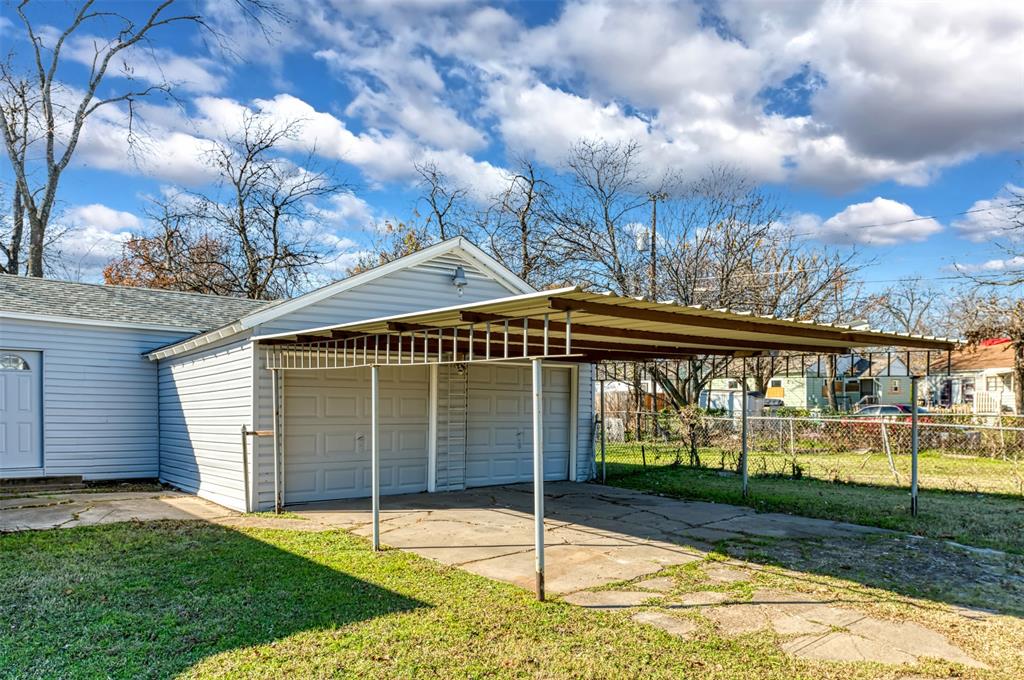 2667 Custer Drive Dallas, TX 75216 - Photo 29 of 33 a house with trees in the background