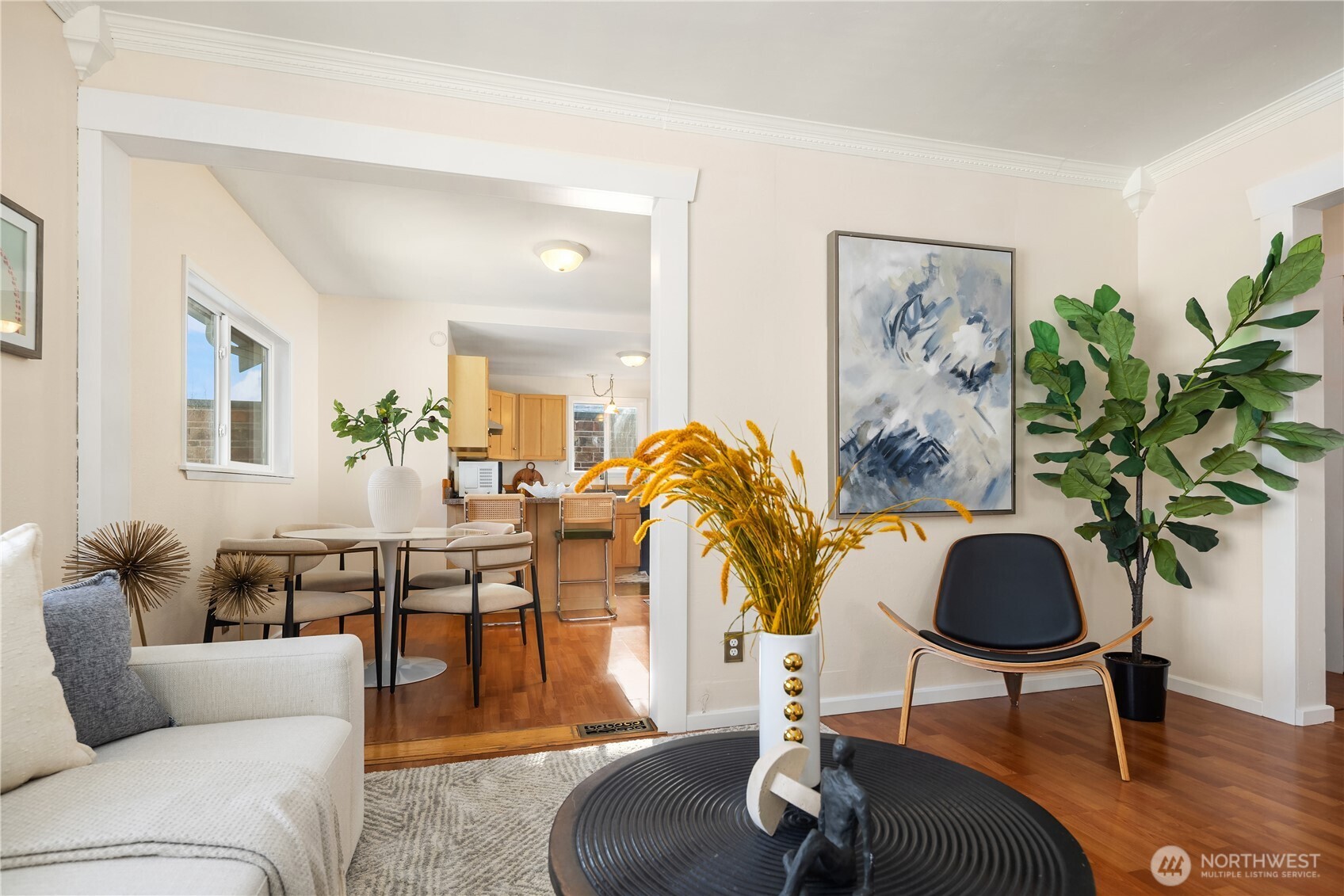 151 North 77th Street Seattle, WA 98103 - Photo 3 of 27 a living room with furniture a potted plant and a rug