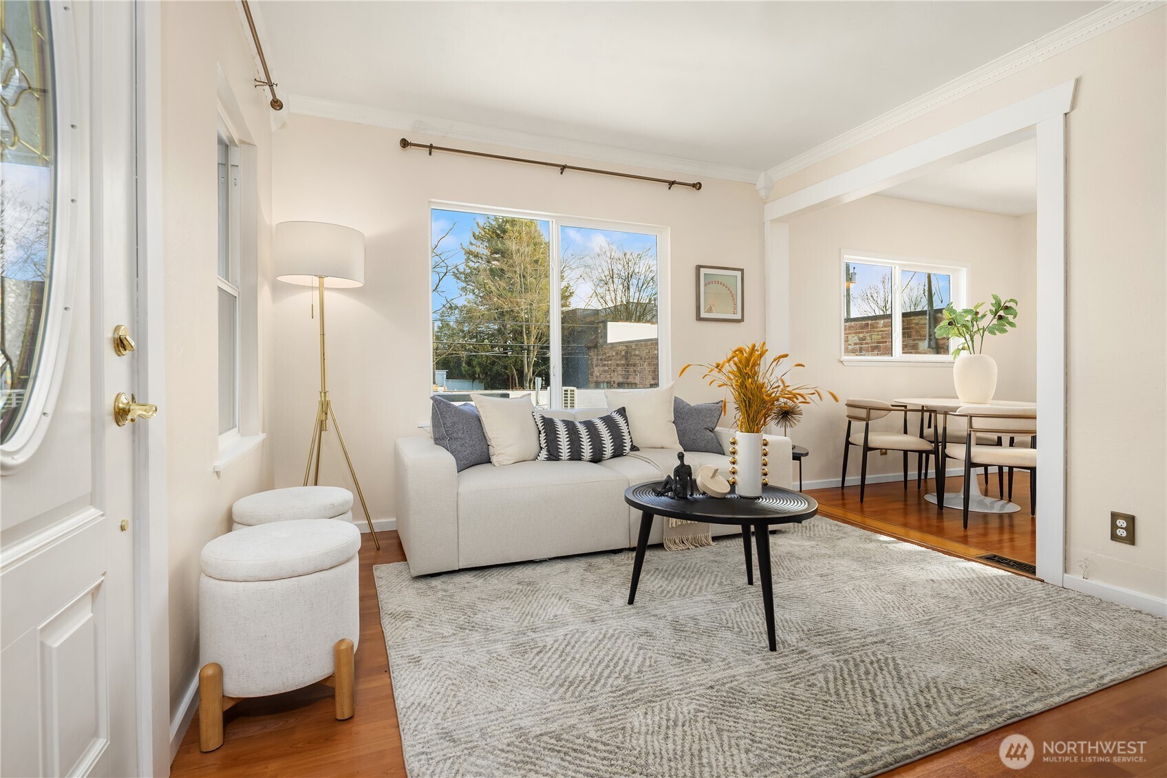 151 North 77th Street Seattle, WA 98103 - Photo 5 of 27 a living room with furniture and a large window