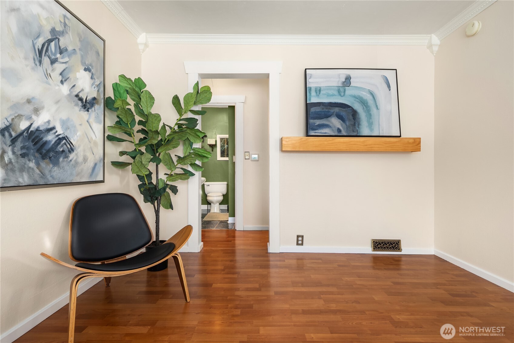 151 North 77th Street Seattle, WA 98103 - Photo 6 of 27 a living room with furniture and a potted plant