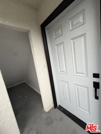 a view of a hallway with entryway