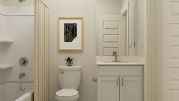 a bathroom with a sink toilet and vanity