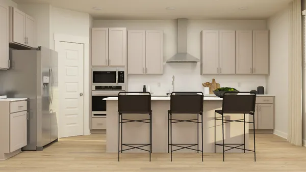 a kitchen with stainless steel appliances kitchen island granite countertop a table and chairs