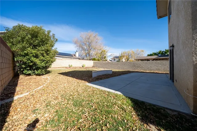 a view of a swimming pool with an outdoor space