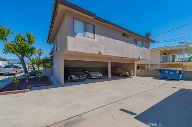 a view of a building with a garage